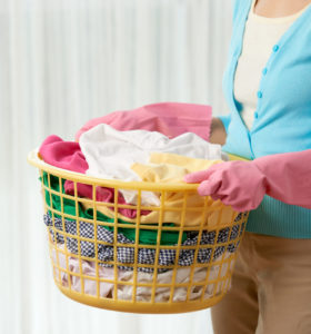 Young Woman Doing Laundry